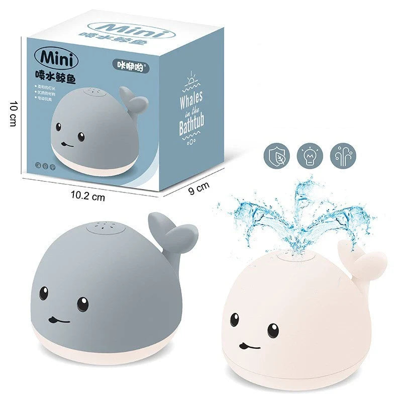 Adorable whale-shaped water sprinkler toy with LED lights and music for baby bath time entertainment