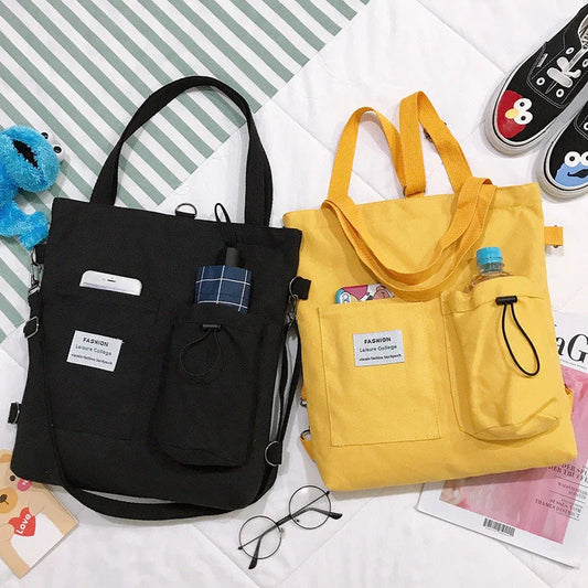 Stylish Harajuku-inspired canvas backpack with zipper closure, adjustable straps, and vibrant color options for students and women