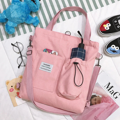 Stylish Harajuku-inspired canvas backpack with zipper closure, adjustable straps, and vibrant color options for students and women