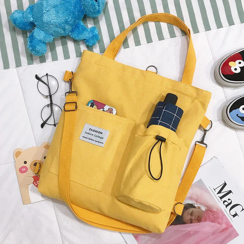 Stylish Harajuku-inspired canvas backpack with zipper closure, adjustable straps, and vibrant color options for students and women