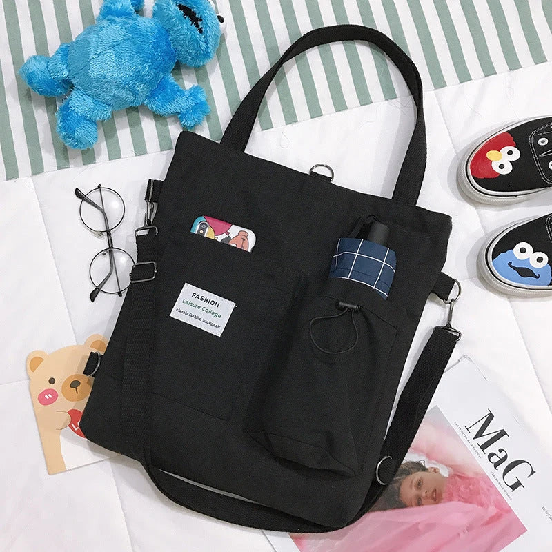 Stylish Harajuku-inspired canvas backpack with zipper closure, adjustable straps, and vibrant color options for students and women