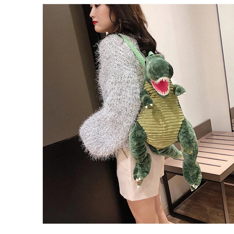 3D dinosaur plush backpack for children in blue, red, brown, and green