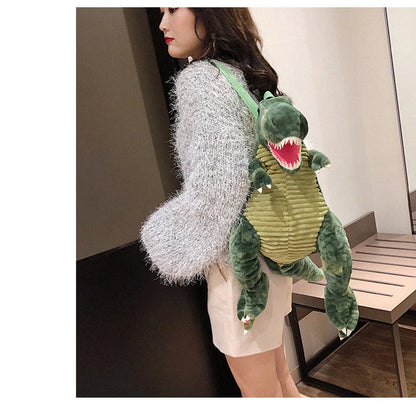 3D dinosaur plush backpack for children in blue, red, brown, and green