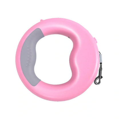 Retractable dog leash with night light in blue and pink options