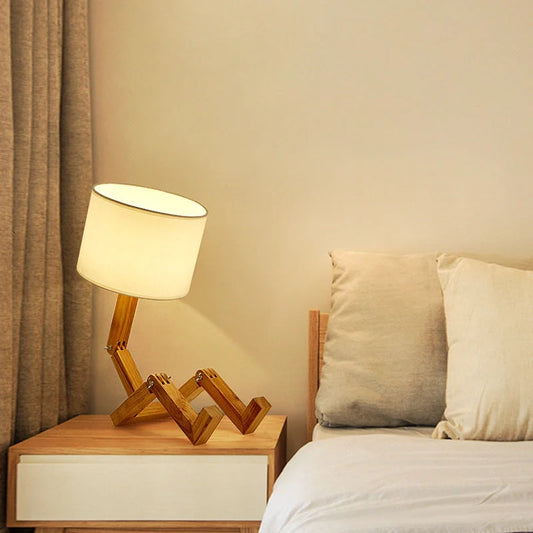 Robot-shaped LED table lamp with wooden base and linen shade for modern Nordic decor