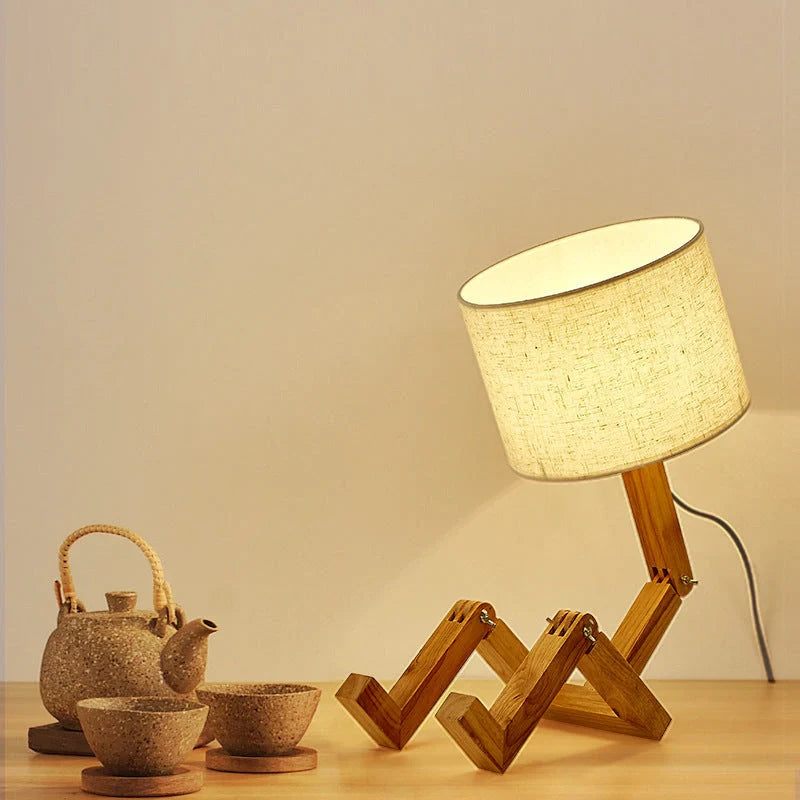Robot-shaped LED table lamp with wooden base and linen shade for modern Nordic decor