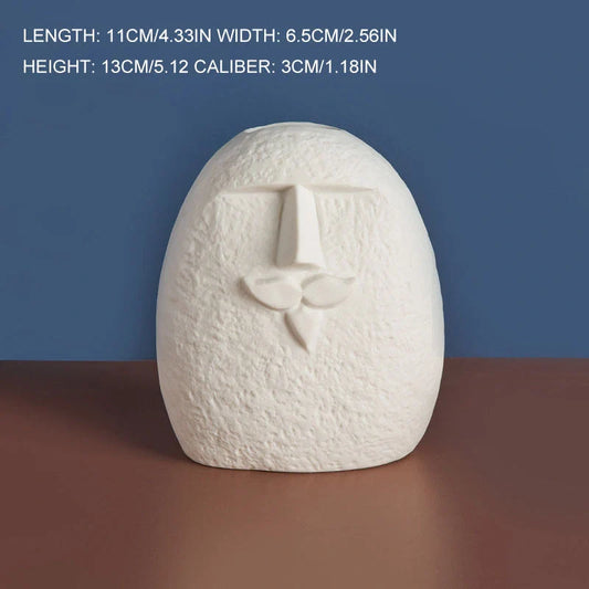 Ceramic face vase with unique facial expressions for home and office decoration
