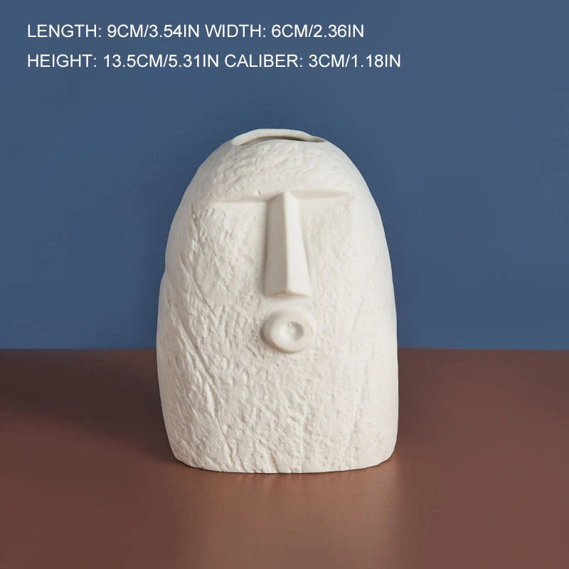Ceramic face vase with unique facial expressions for home and office decoration