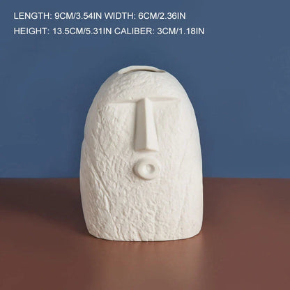 Ceramic face vase with unique facial expressions for home and office decoration