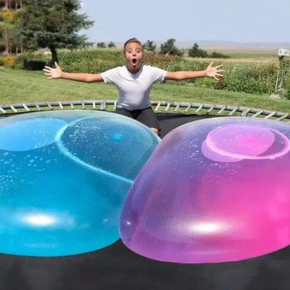 Oversized inflatable bounce balls in various vibrant colors for fun parties and celebrations