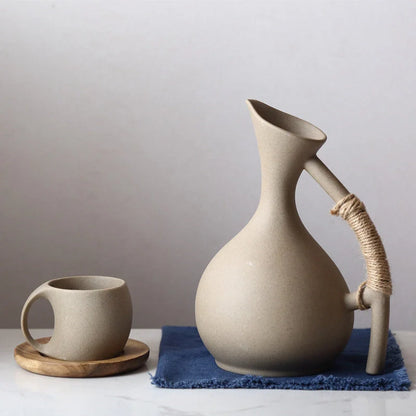 Premium ceramic cold brew teapot set with elegant floral design, including teapot, lid, and bamboo tray