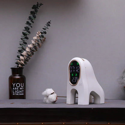 Stylish alarm clock with LED display, ambient lighting, and snooze function for a relaxing sleep environment