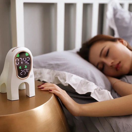 Stylish alarm clock with LED display, ambient lighting, and snooze function for a relaxing sleep environment