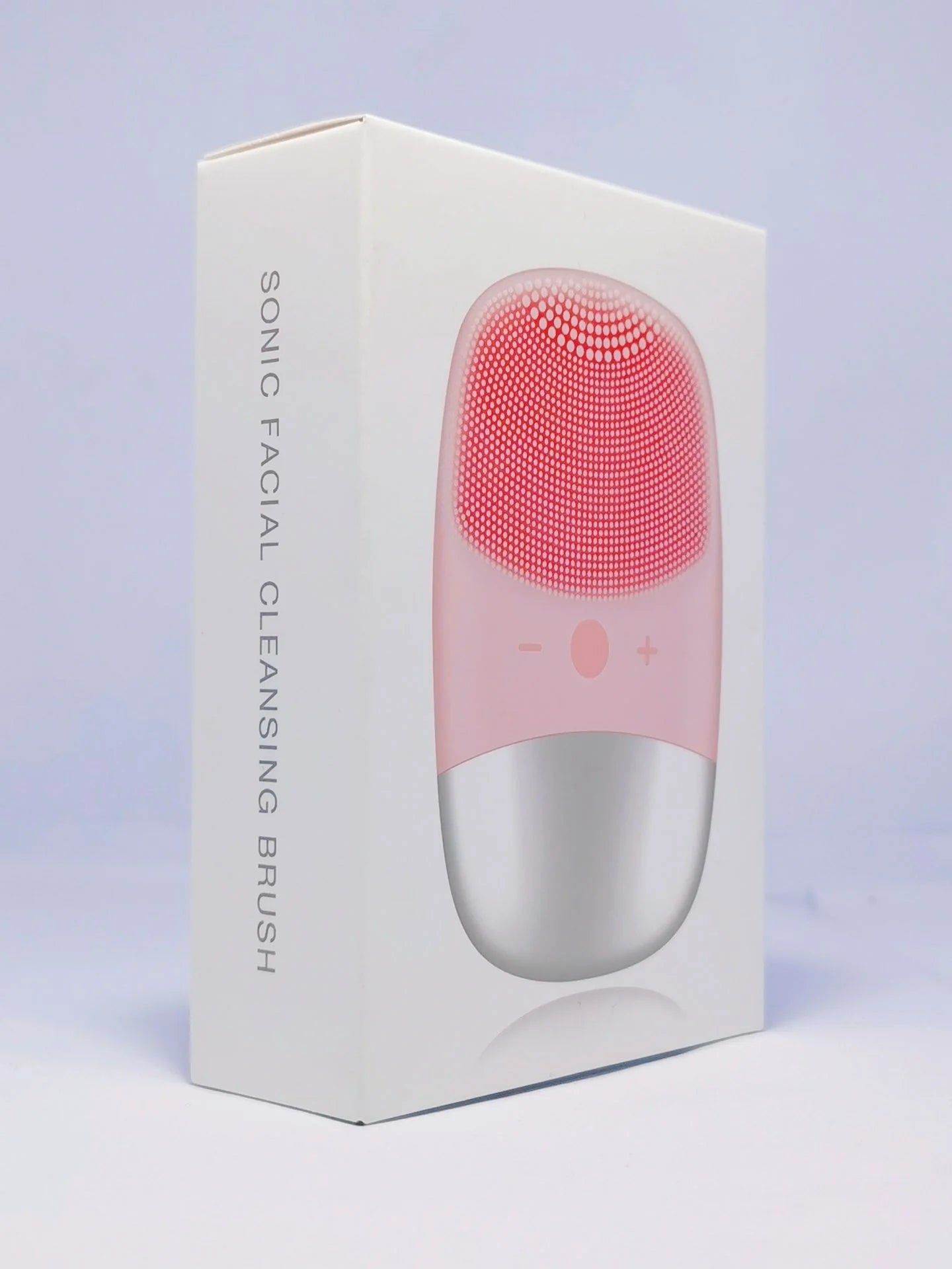 Mini sonic silicone electric facial cleansing brush in pink with USB charging
