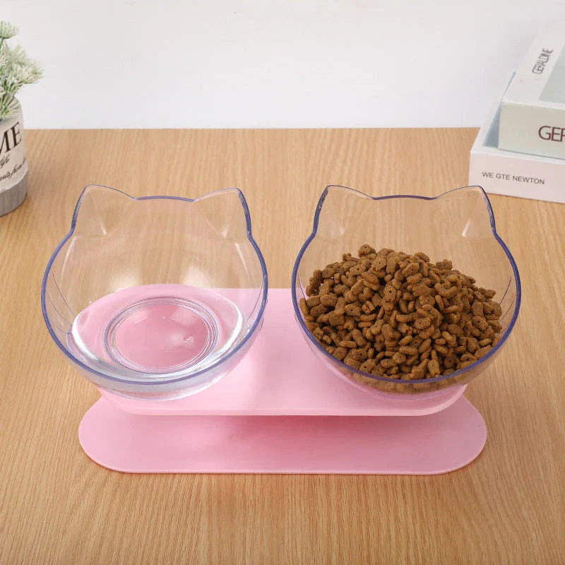 Inclined transparent cat food bowl with a gently sloped base and ergonomic design for whisker-friendly dining
