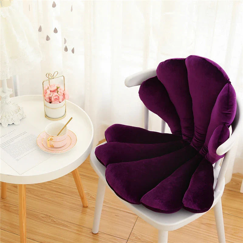 Luxurious velvet armchair cushion with unique rose seat design, available in various colours for comfortable relaxation in your living space.