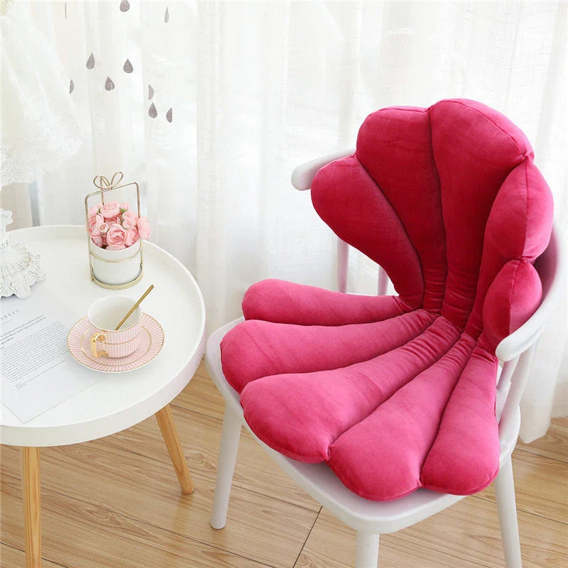 Luxurious velvet armchair cushion with unique rose seat design, available in various colours for comfortable relaxation in your living space.