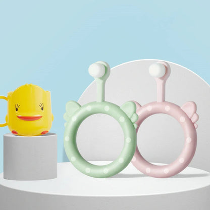 Infant children's soft toothbrush set in blue, pink, and green with silicone bristles