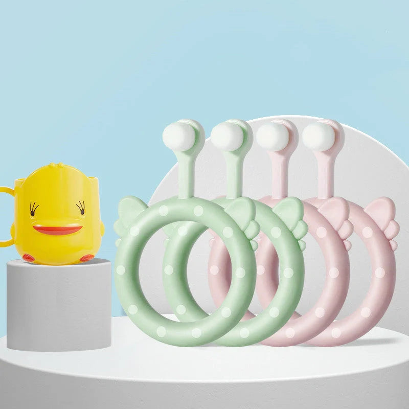 Infant children's soft toothbrush set in blue, pink, and green with silicone bristles