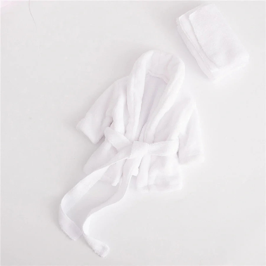 Baby bathrobe and towel set in pink and white, perfect for newborns