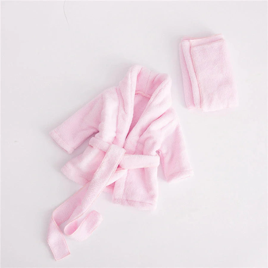 Baby bathrobe and towel set in pink and white, perfect for newborns
