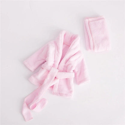 Baby bathrobe and towel set in pink and white, perfect for newborns