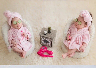 Baby bathrobe and towel set in pink and white, perfect for newborns
