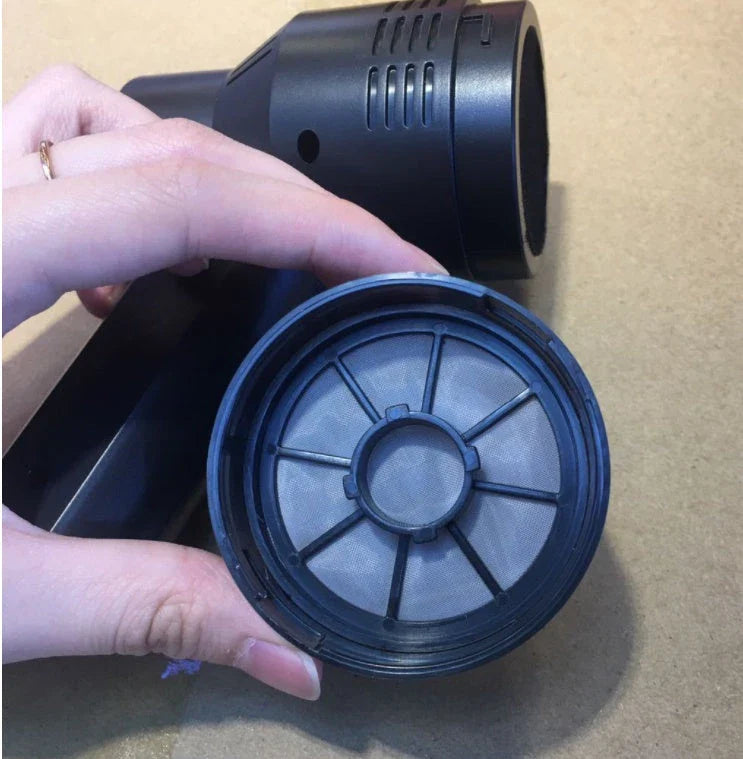 Cordless vacuum cleaner with powerful suction for removing dust and lint from household surfaces