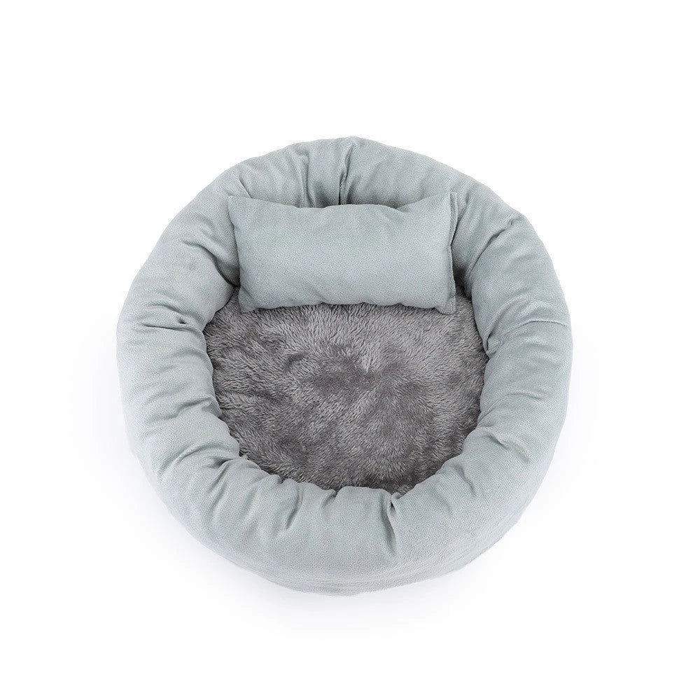 Cosy luxury indoor pet bed for cats and dogs, featuring soft vegan faux shag fur and deep crevices for burrowing comfort