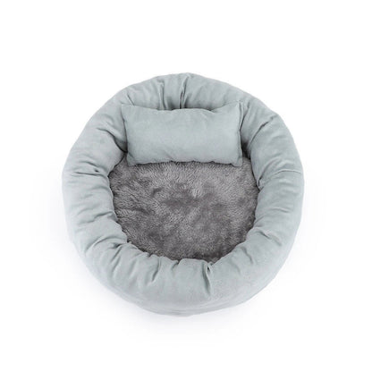 Cosy luxury indoor pet bed for cats and dogs, featuring soft vegan faux shag fur and deep crevices for burrowing comfort