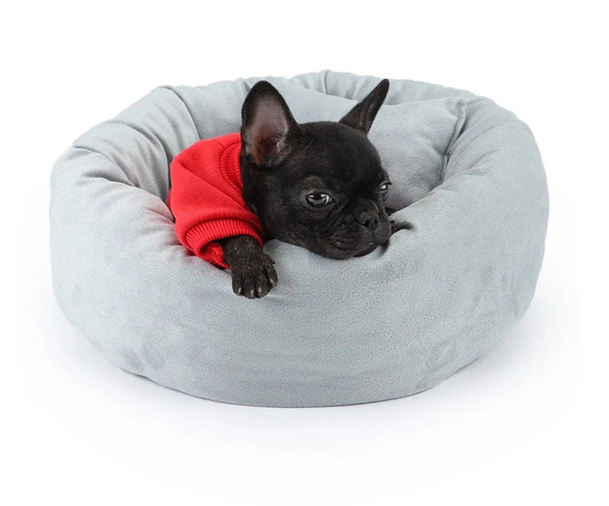 Cosy luxury indoor pet bed for cats and dogs, featuring soft vegan faux shag fur and deep crevices for burrowing comfort