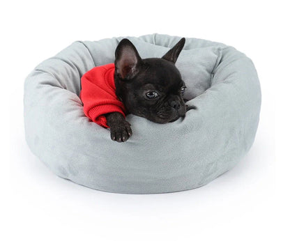 Cosy luxury indoor pet bed for cats and dogs, featuring soft vegan faux shag fur and deep crevices for burrowing comfort