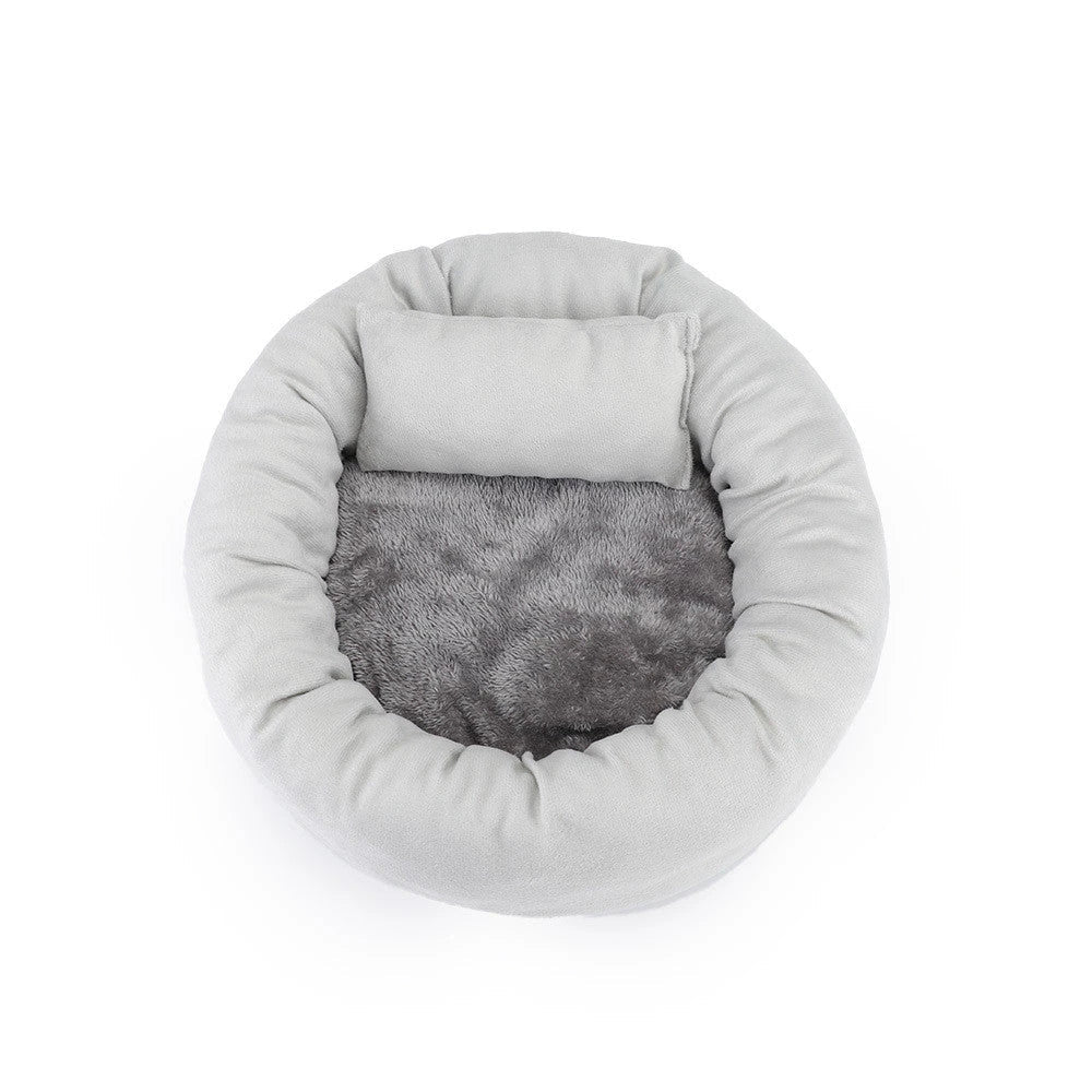 Cosy luxury indoor pet bed for cats and dogs, featuring soft vegan faux shag fur and deep crevices for burrowing comfort