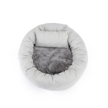 Cosy luxury indoor pet bed for cats and dogs, featuring soft vegan faux shag fur and deep crevices for burrowing comfort
