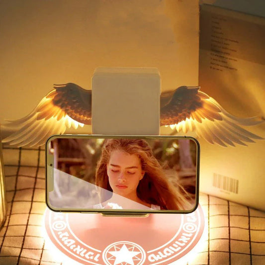 Stylish wireless charging dock with unfolding angel wings, providing fast and safe charging for compatible smartphones