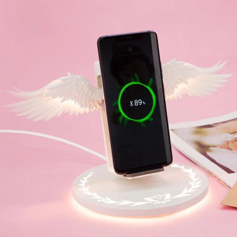 Stylish wireless charging dock with unfolding angel wings, providing fast and safe charging for compatible smartphones