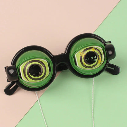 Quirky eyewear accessories in various colours, including yellow, pink, black, and black-green. Designed for kids' parties to encourage imagination and play.
