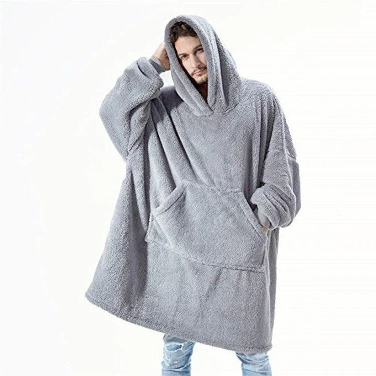Cozy oversized hooded sweatshirt with big front pocket, made of soft double-sided fleece fabric in a variety of classic colors.