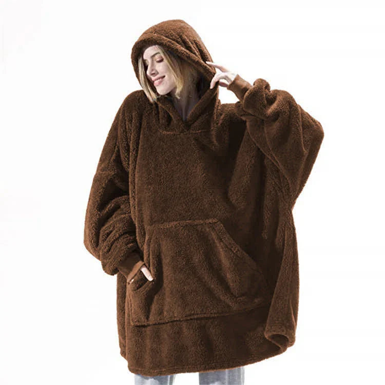 Cozy oversized hooded sweatshirt with big front pocket, made of soft double-sided fleece fabric in a variety of classic colors.