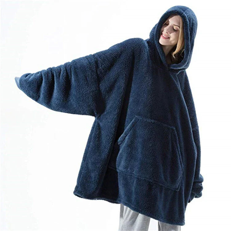 Cozy oversized hooded sweatshirt with big front pocket, made of soft double-sided fleece fabric in a variety of classic colors.