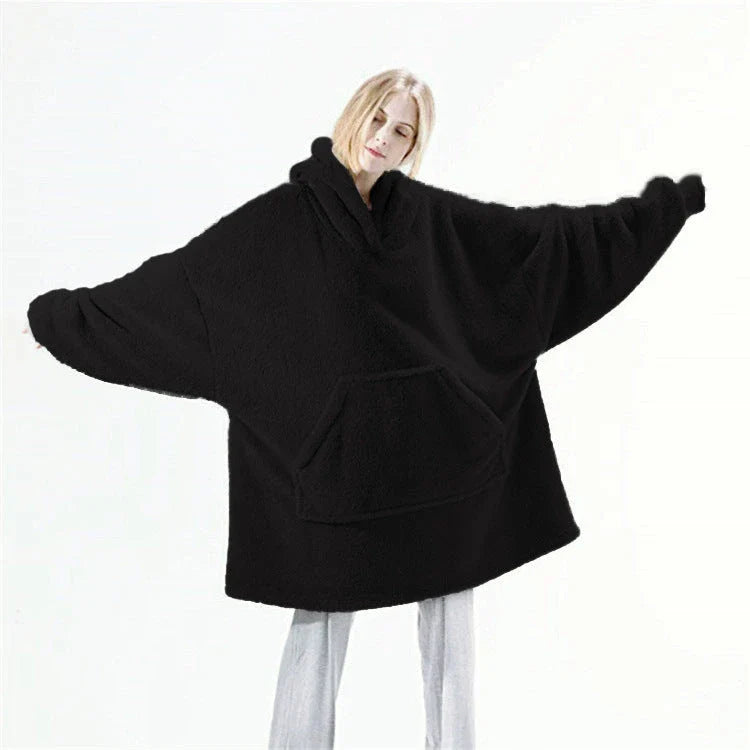 Cozy oversized hooded sweatshirt with big front pocket, made of soft double-sided fleece fabric in a variety of classic colors.