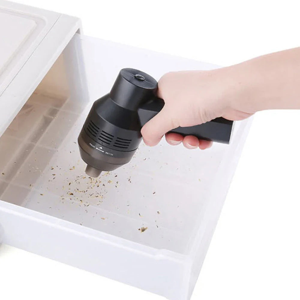 Cordless vacuum cleaner with powerful suction for removing dust and lint from household surfaces