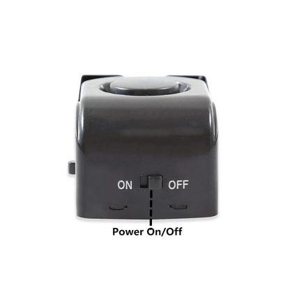 Wedge-shaped home security alarm with ABS construction and loud siren to deter intruders