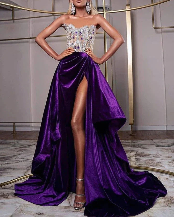 A glamorous purple sequin cocktail dress with a small train, sleeveless design, and rhinestone embellishments, suitable for special occasions in the UK.