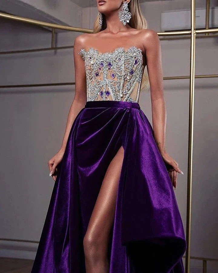 A glamorous purple sequin cocktail dress with a small train, sleeveless design, and rhinestone embellishments, suitable for special occasions in the UK.