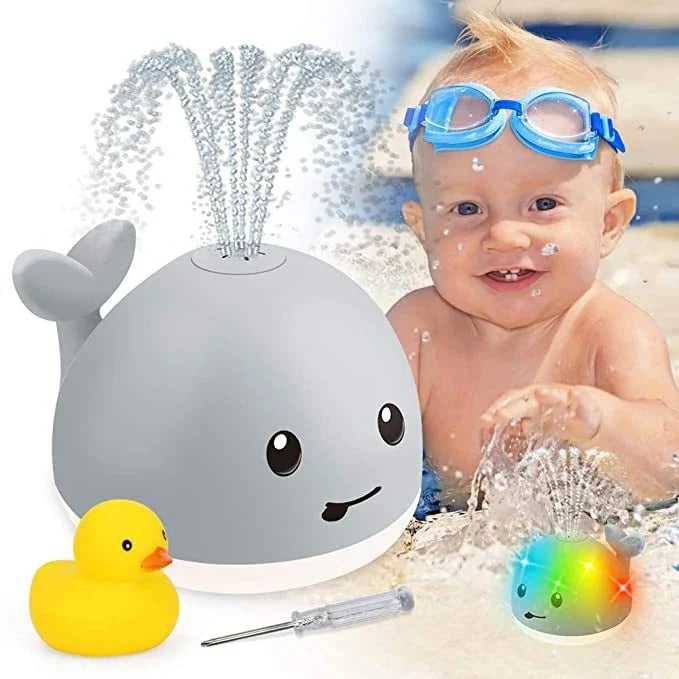 Adorable whale-shaped water sprinkler toy with LED lights and music for baby bath time entertainment