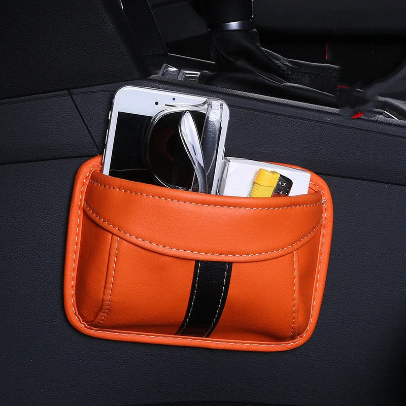 Adhesive car seat storage bag in various colours for secure item organisation