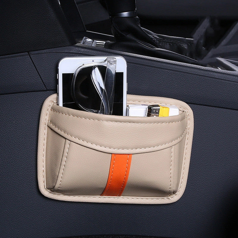 Adhesive car seat storage bag in various colours for secure item organisation