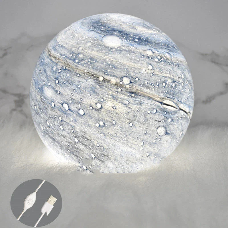 A mesmerising USB-powered night light featuring a captivating wandering earth design and adjustable lighting settings