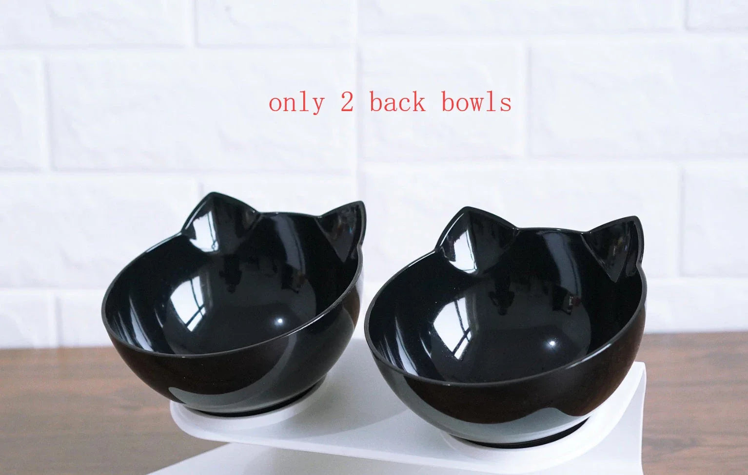 Inclined transparent cat food bowl with a gently sloped base and ergonomic design for whisker-friendly dining